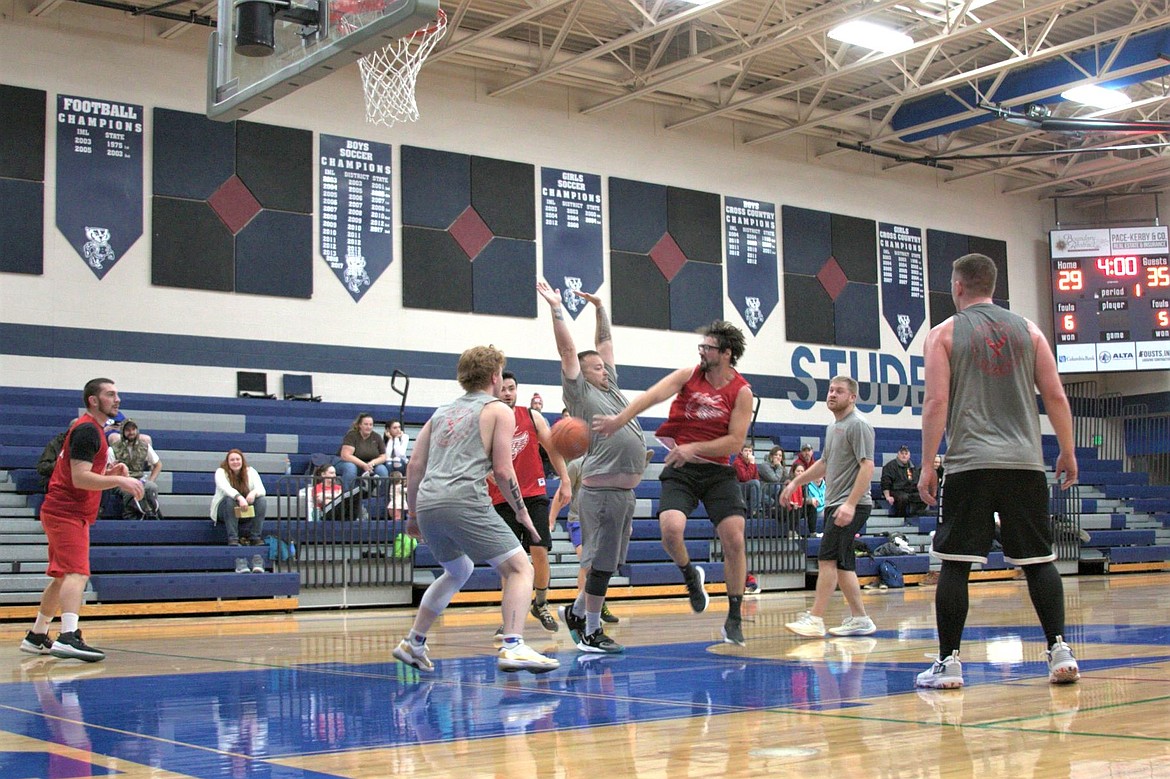 Stefan of Team Bombers outlets a pass in the first round game against Team Turner Plumbing.