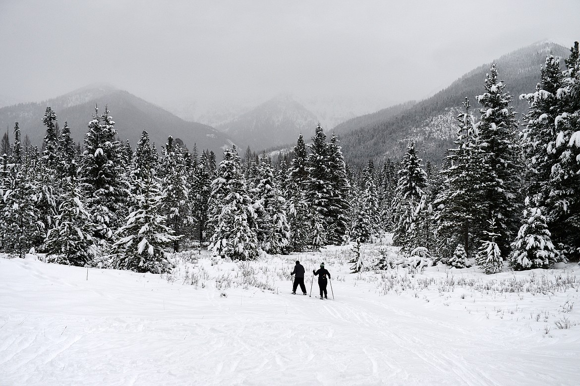 Marilyn and Pat Lee start towards the Aeneas Loop trail at the Bigfork Community Nordic Center trails on Foothill Road on Thursday, Jan. 6. (Casey Kreider/Daily Inter Lake)