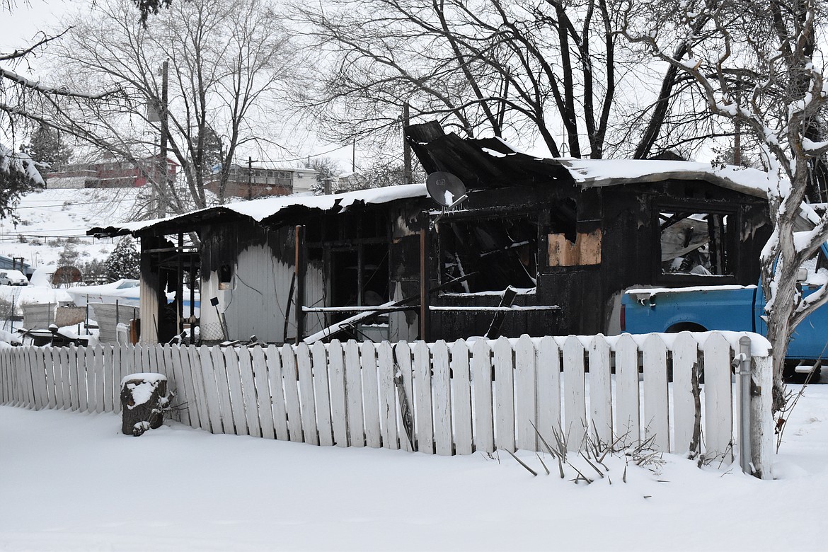 Charred walls remain after a home on Second Avenue Northeast in Soap Lake burned Wednesday.