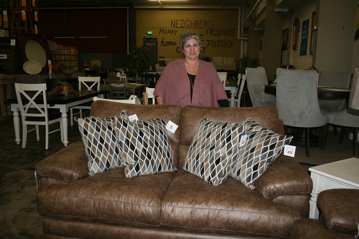 The Home Center general manager Wendy Cox stands in the store showroom.