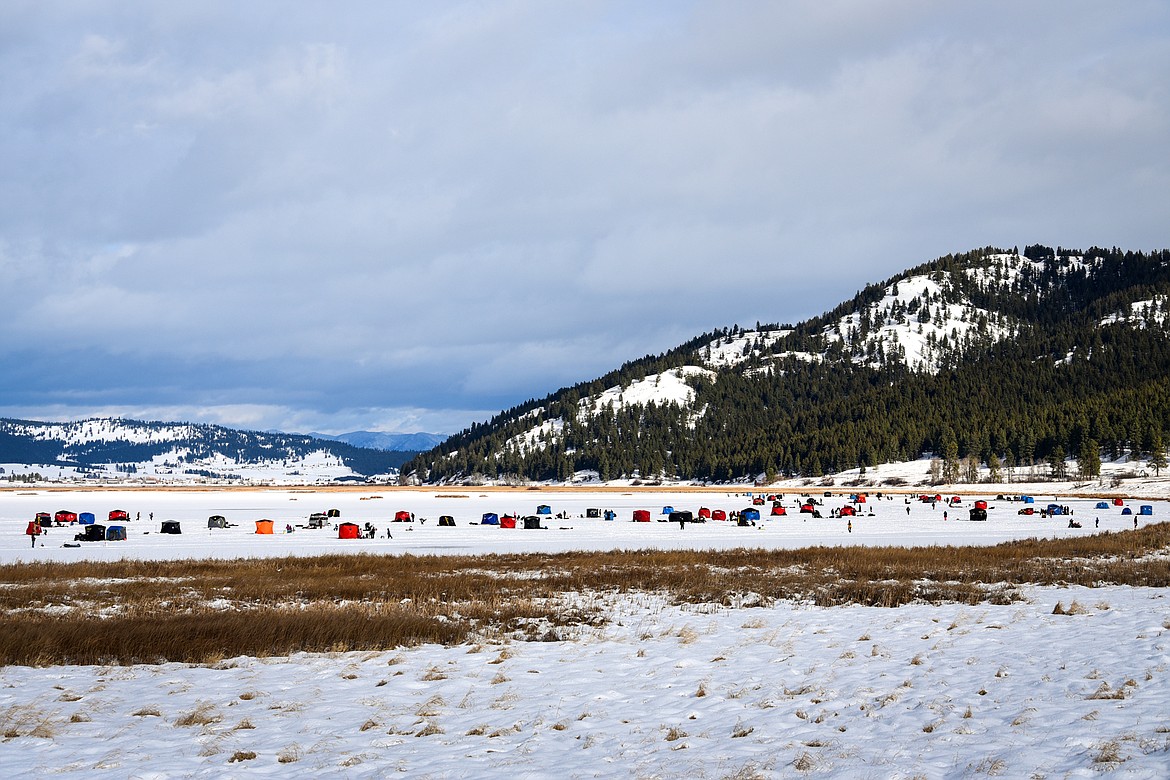 Ice fishing tents spread out across Smith Lake at the 51st Sunriser Lions Family Ice Fishing Derby in Kila on Saturday, Jan. 8. (Casey Kreider/Daily Inter Lake)