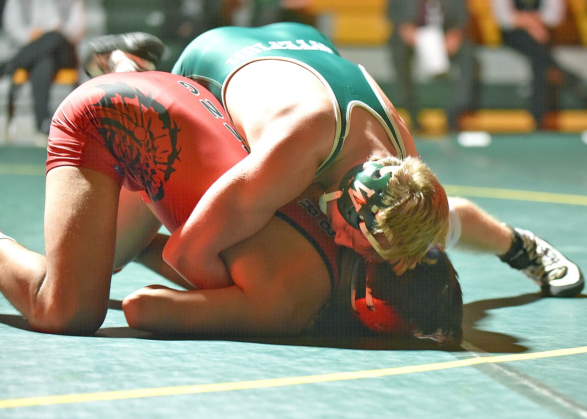 Whitefish’s Henry Bennetts wrestles against Browning at a home dual on Thursday. (Whitney England/Whitefish Pilot)