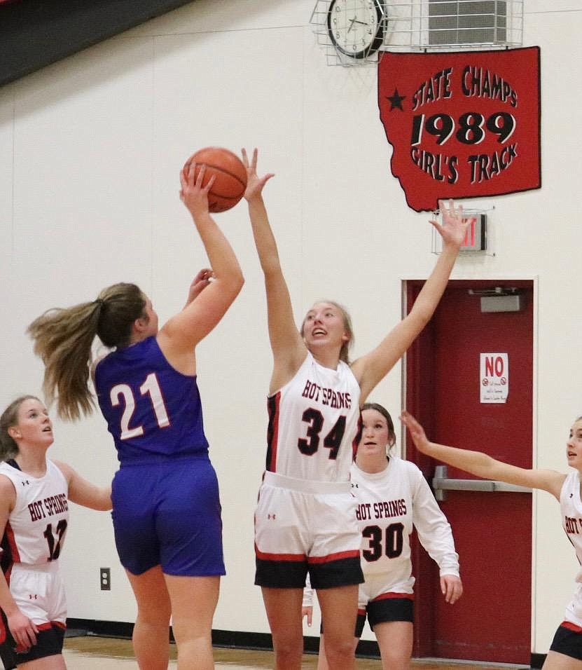 Superior senior Cassie Green spots over Hot Springs sophomore Lauryn Aldridge during the Lady Bobcats' win Saturday night.  (Kami Milender for the MI-VP)