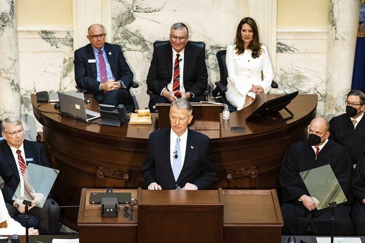 Idaho Gov. Brad Little delivers his State of the State address inside the house chambers at the state Capitol building, Monday, Jan. 10, in Boise. Behind him are Senate Majority Leader Chuck Winder (R-Boise), Speaker of the House Scott Bedke (R-Oakley), and Lt. Gov. Janice McGeachin.