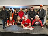 Signing photos Jan. 26, 2022