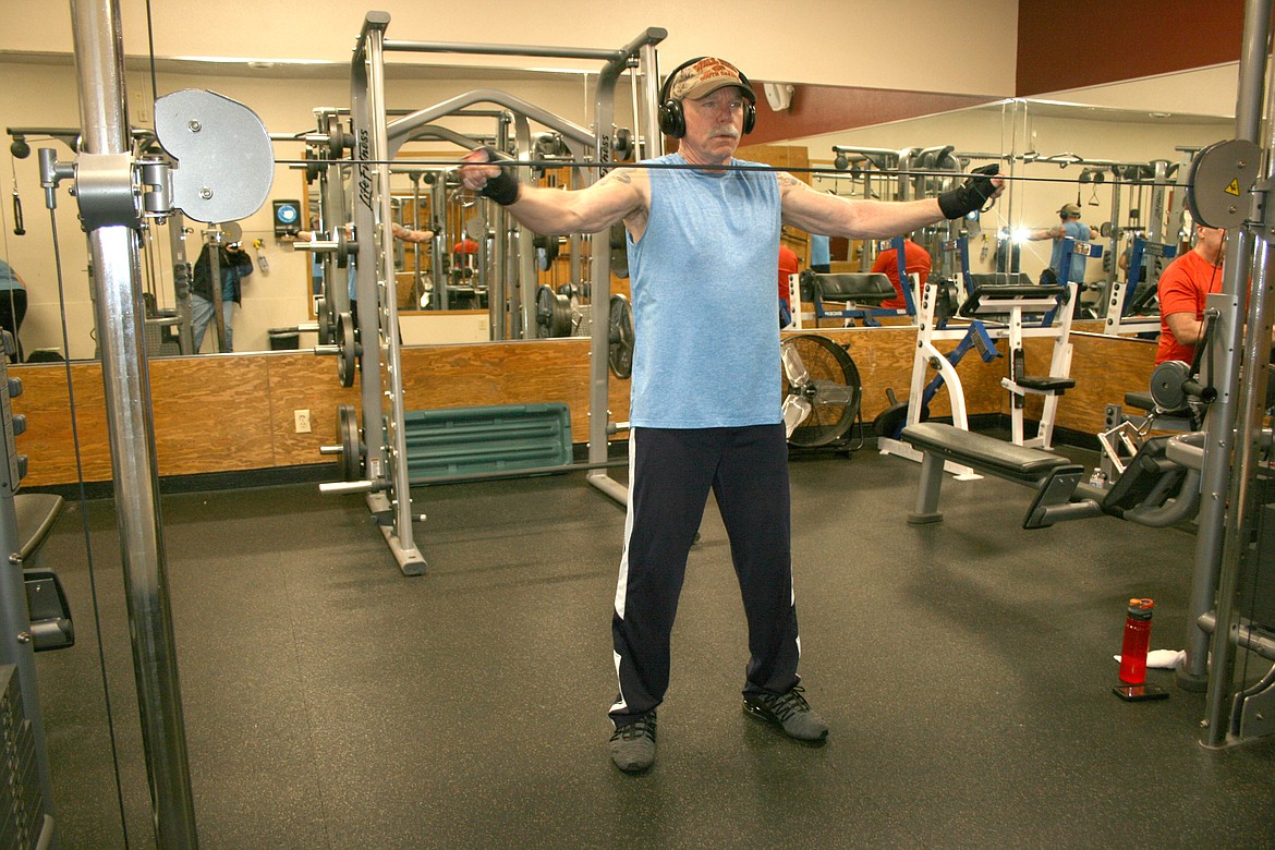 Bob Ray works on his upper body Friday at the South Campus Athletic Club in Moses Lake.