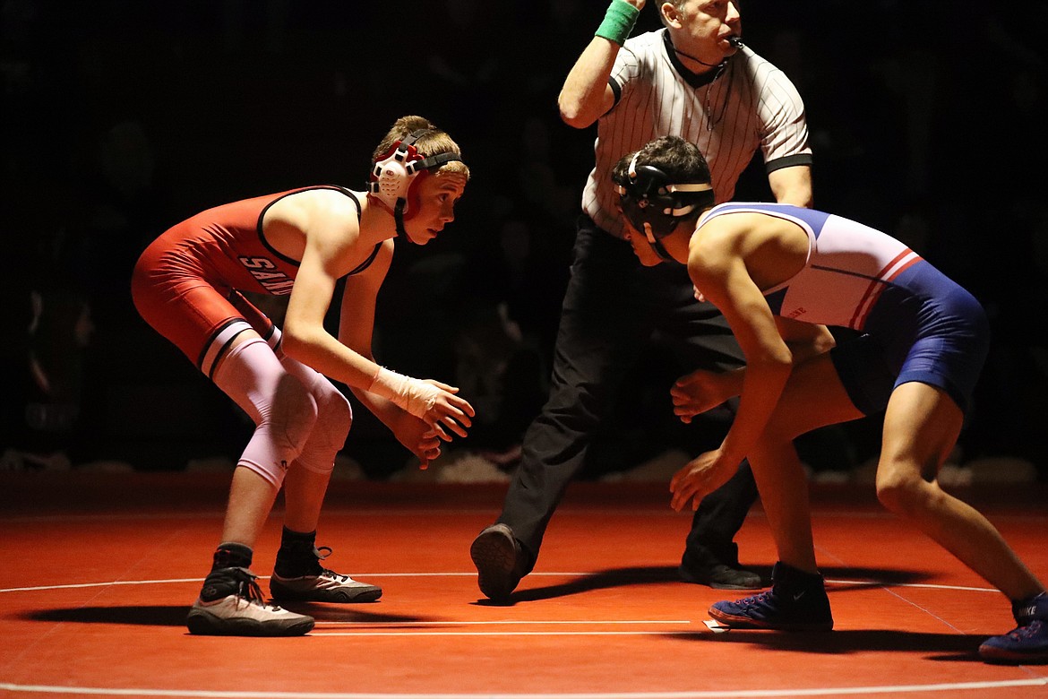 Andrew Duke (left) faces off with his opponent Wednesday.