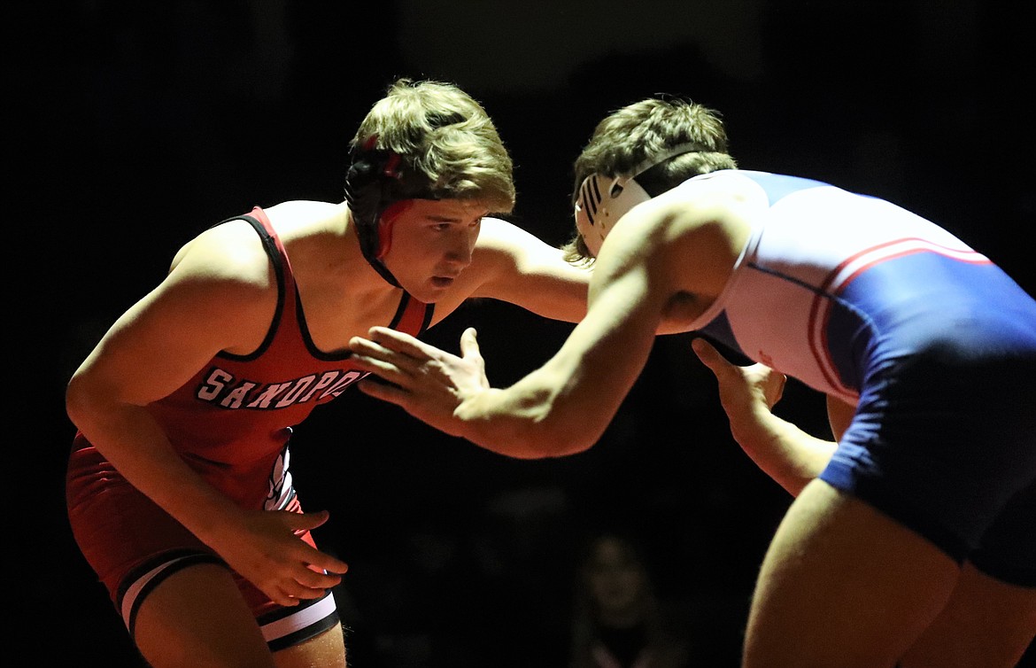 Calvin Hinds (left) competes in his 170-pound match Wednesday.