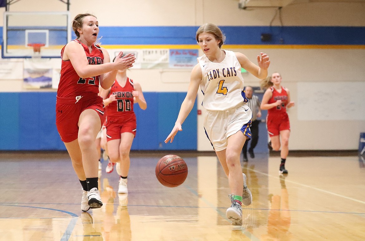 Eloise Shelton pushes the ball up the court on the fast break Tuesday.