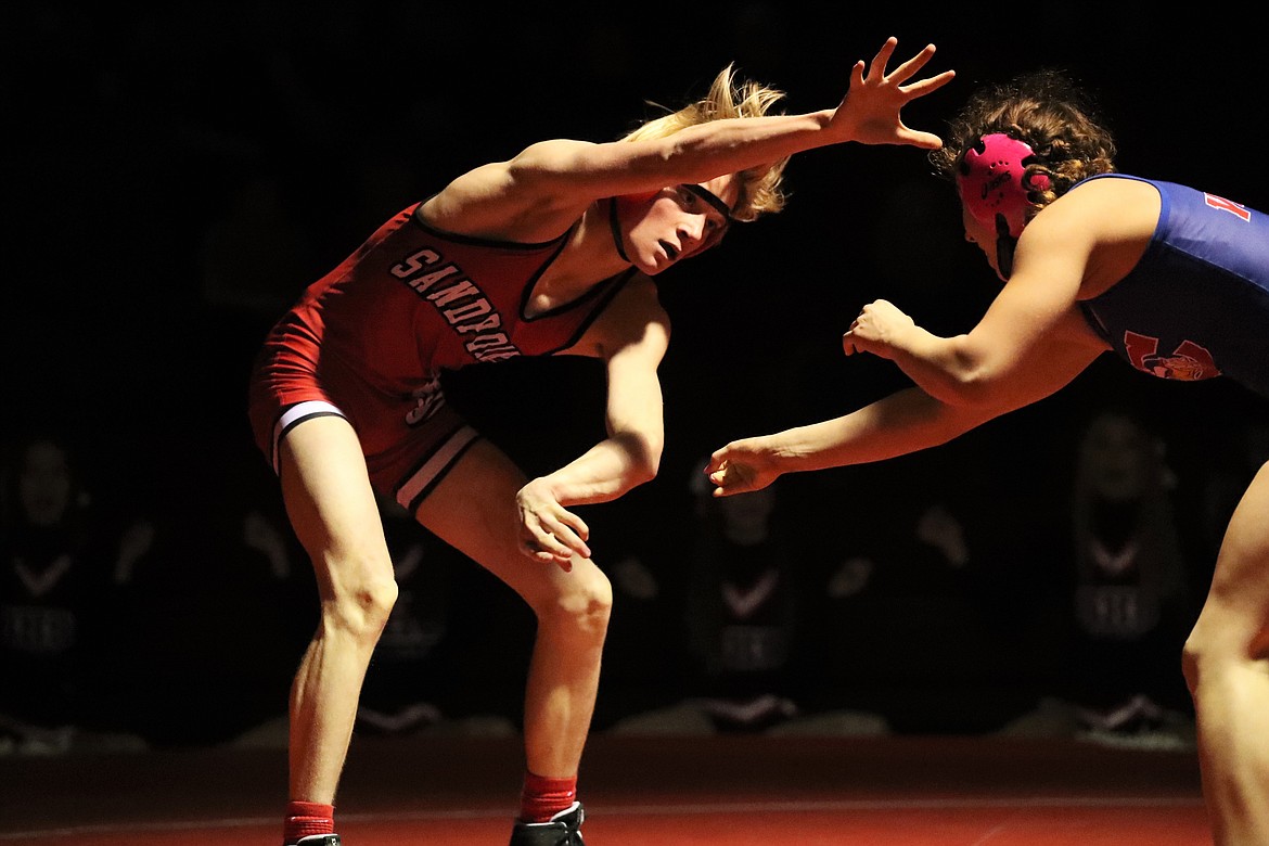 Forest Ambridge (left) hand fights with his opponent Wednesday.