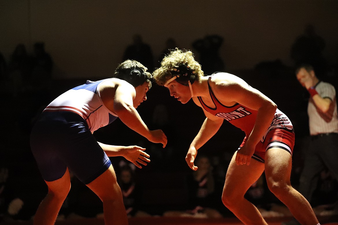 Owen Wimmer (right) faces off with his opponent at 182 pounds Wednesday.