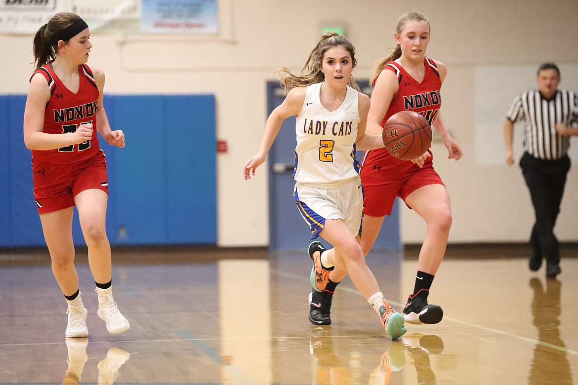 Paige Valliere brings the ball up the court Tuesday.