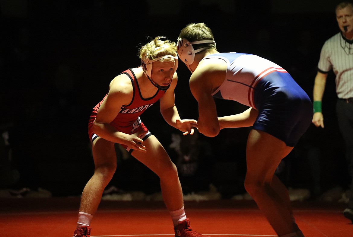 Shane Sherrill (left) competes in a 138-pound bout Wednesday.