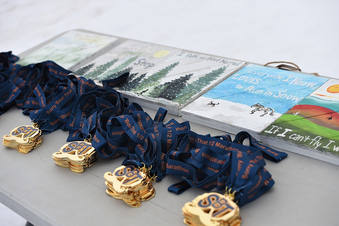 Medals and prizes at the start/finish area. (Scot Heisel/Lake County Leader)