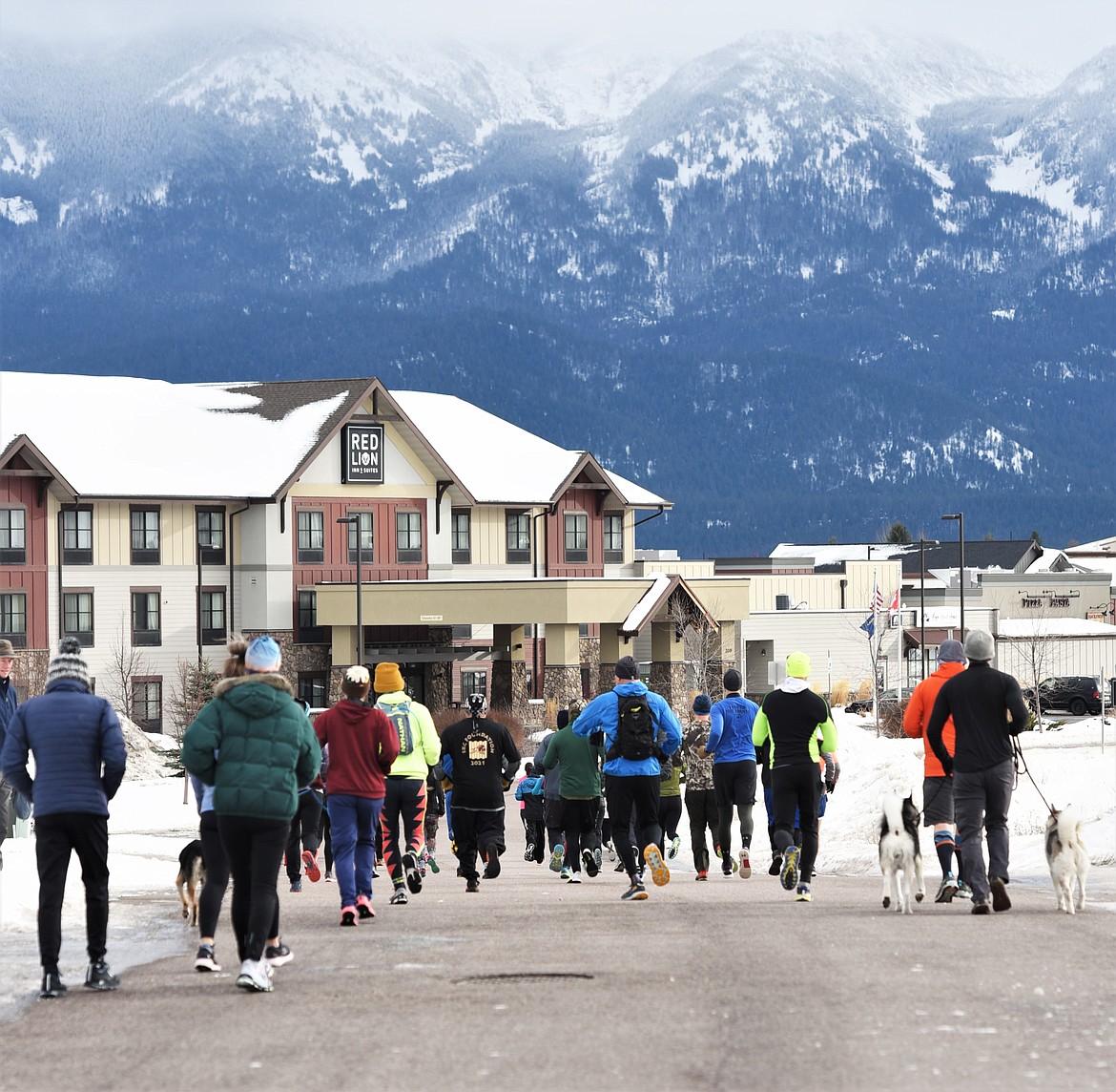 Runners head out from the start/finish area near the Mission Valley Aquatic Center. (Scot Heisel/Lake County Leader)