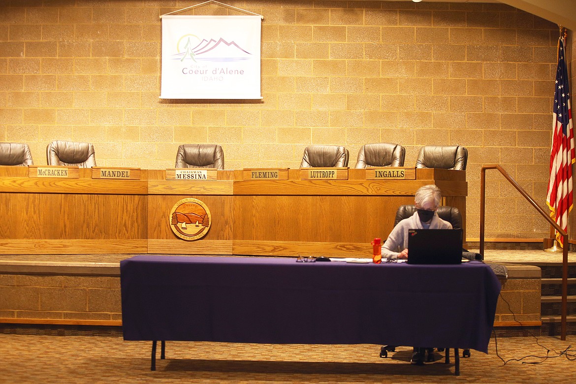 Coeur d'Alene Public Library Trustee Fay Sweney participates in the board's virtual meeting from the Library Community Room on Wednesday.