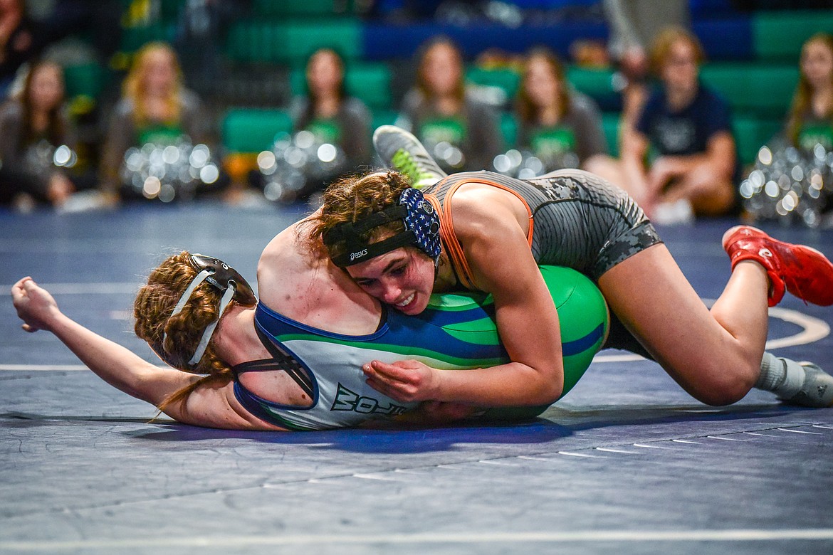 Flathead's Lily Conover wrestles Glacier's Kadence Rose at 138 pounds at Glacier High School on Thursday, Jan. 13. (Casey Kreider/Daily Inter Lake)