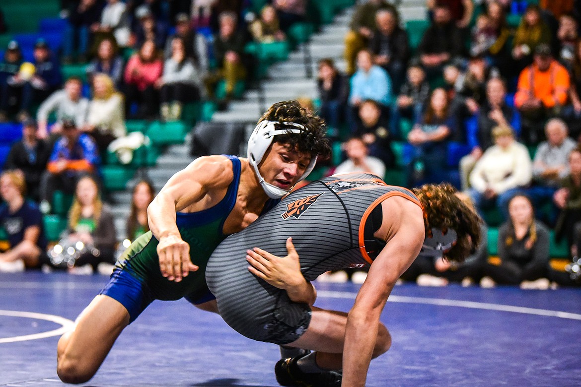 Glacier's Teegan Vazquez wrestles Flathead's Asher Kemppainen at 132 pounds at Glacier High School on Thursday, Jan. 13. (Casey Kreider/Daily Inter Lake)