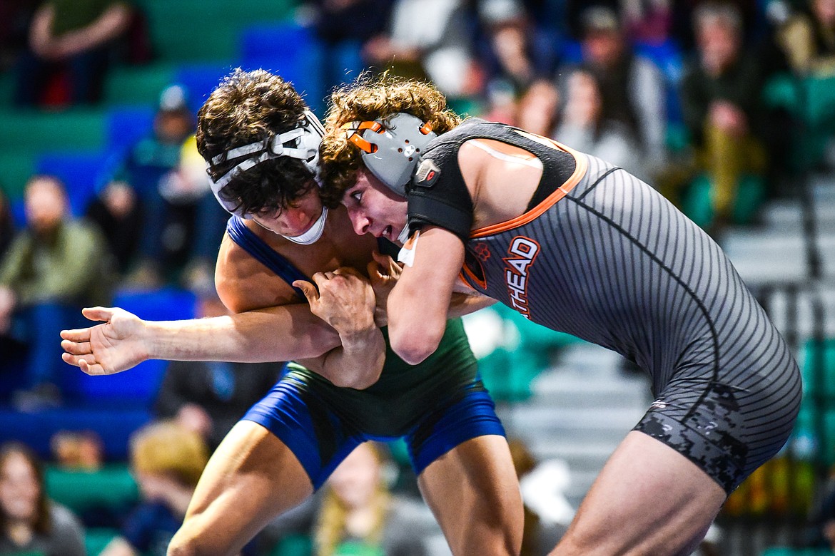 Glacier's Teegan Vazquez wrestles Flathead's Asher Kemppainen at 132 pounds at Glacier High School on Thursday, Jan. 13. (Casey Kreider/Daily Inter Lake)