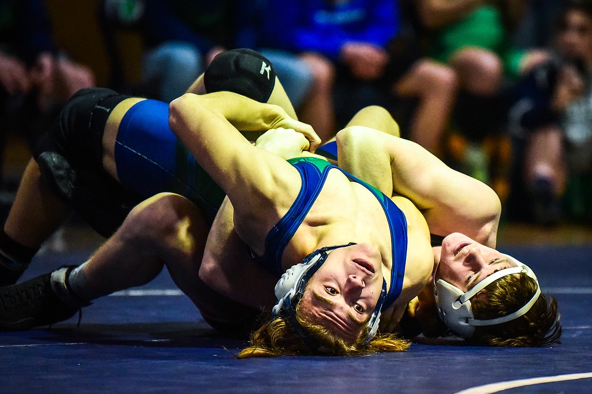 Flathead's Gabe Lake wrestles Glacier's Grayson Barcus at 160 pounds at Glacier High School on Thursday, Jan. 13. (Casey Kreider/Daily Inter Lake)