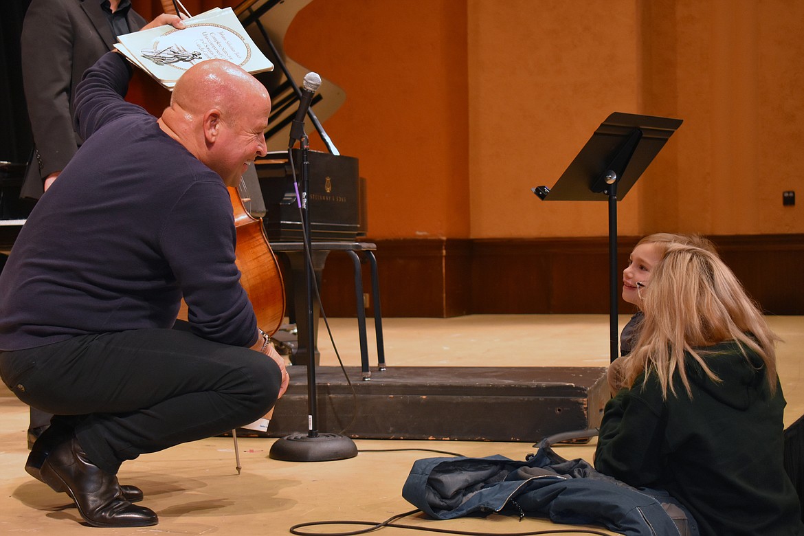 Robert deMaine, principal cellist with the Los Angeles Philharmonic, speaks with children during Glacier Symphony, Orchestra and Chorale's Wild About Music program.
When a guest artist plays with the Glacier Symphony, Orchestra, GSC sponsors a Wild About Music concert for students in grades K through 12 on the Friday before the concert weekend.