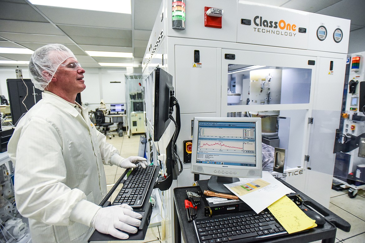 Craig Meuchel works on a Solstice S8 automated electroplating system at the ClassOne Technology Development Center in Kalispell on Wednesday, Jan. 12. (Casey Kreider/Daily Inter Lake)