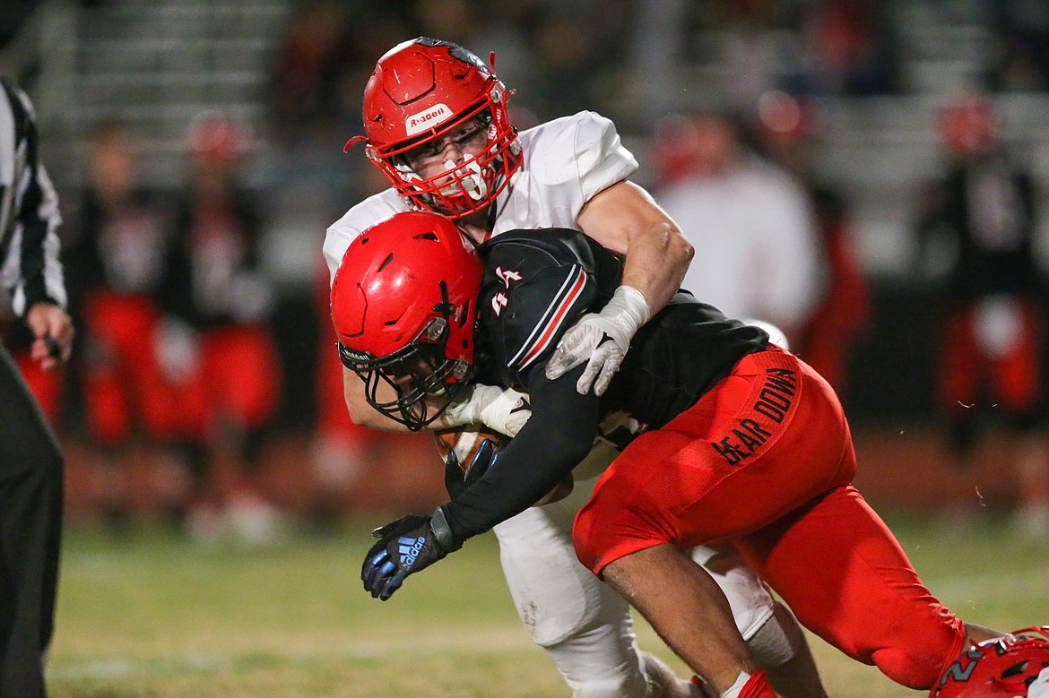 Sandpoint's Levi Balison takes down Moscow's Isaiah Murphy during a game this past season. Balison is taking part in the 2022 USPA Drug Tested Idaho State Championships on Feb. 26.