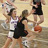 PREP GIRLS BASKETBALL: Vikings get back on pace, down Trojans