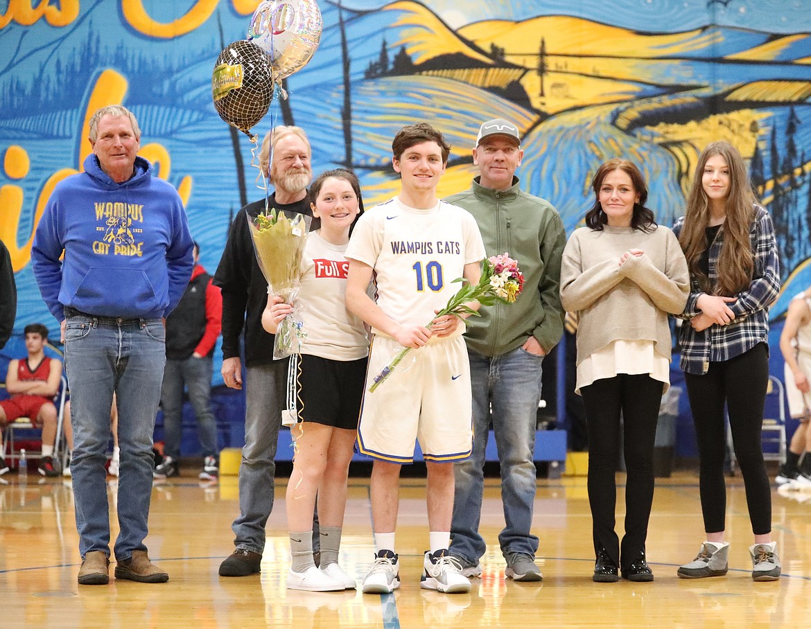 Cole Reuter celebrates Senior Night with his family.