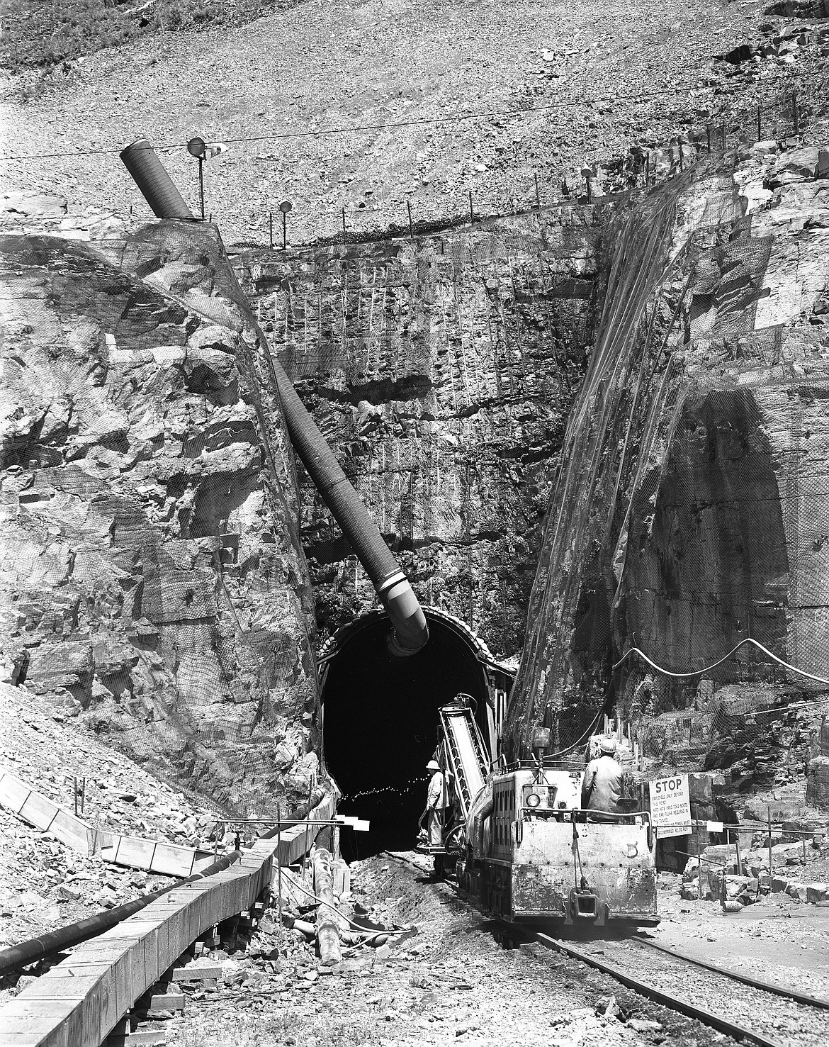 Crews work on the south portal of the Flathead Tunnel in June, 1968. (Mel Ruder/Hungry Horse News file photo)