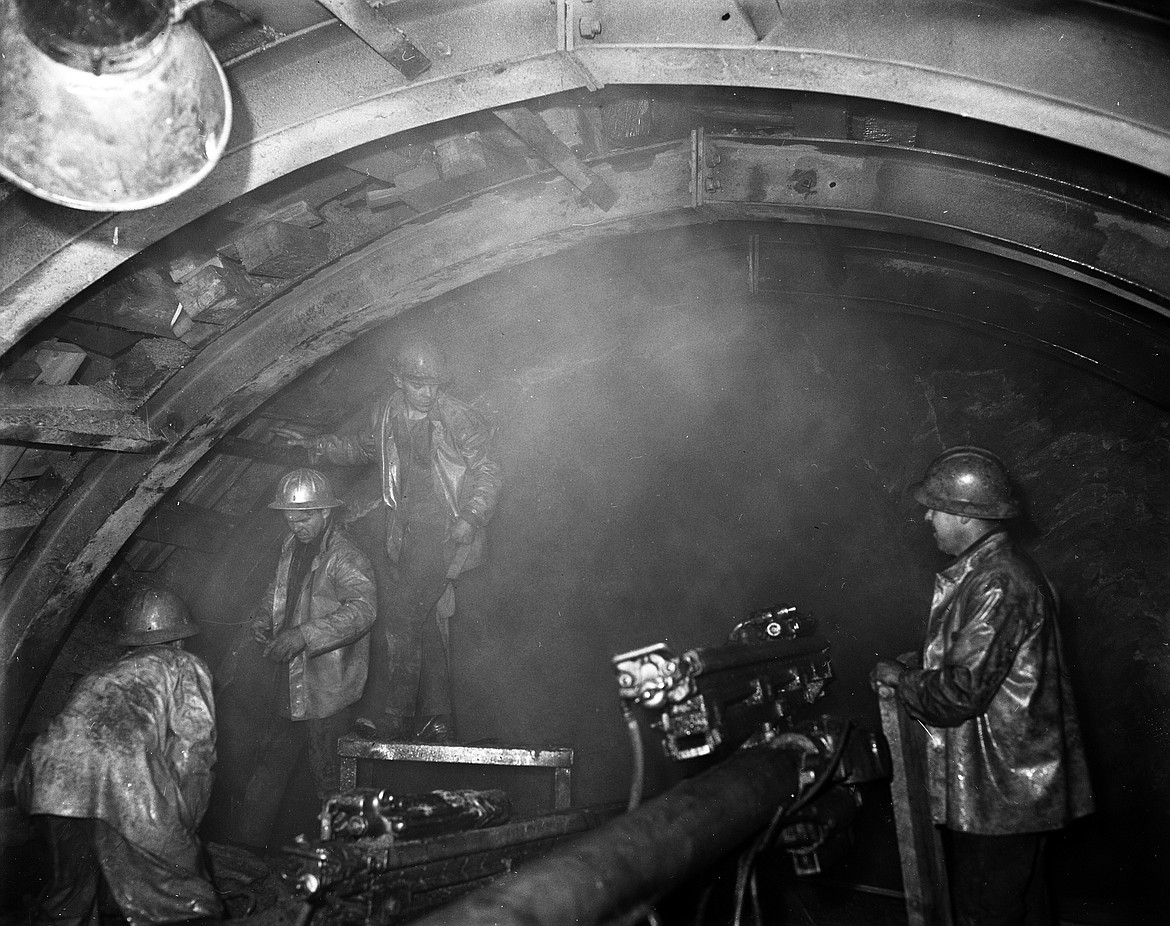 Workers drill during construction of the Flathead Tunnel in early June, 1968. (Mel Ruder/Hungry Horse News file photo)