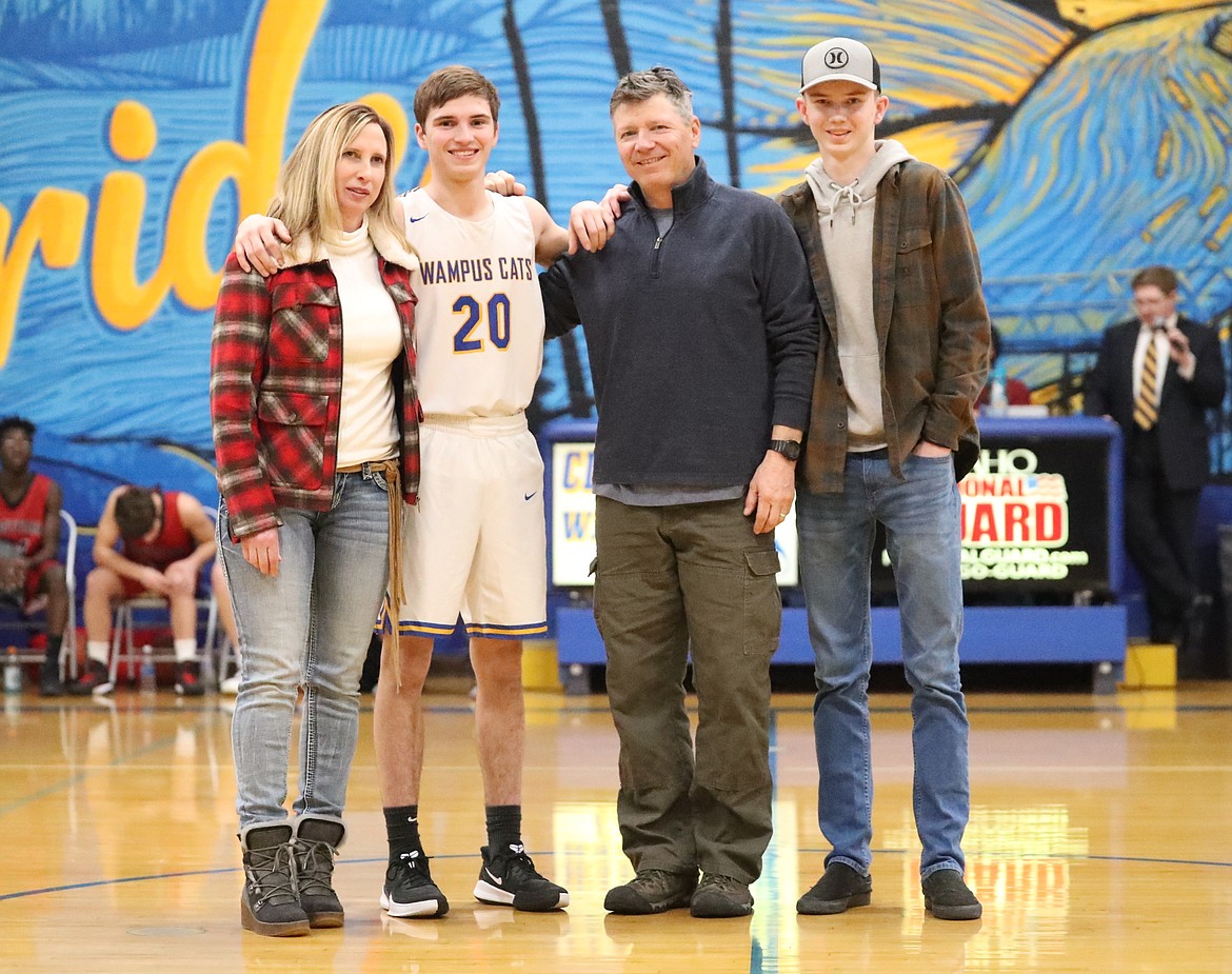 Sam Barnett celebrates Senior Night with his family.