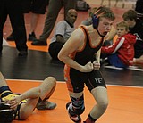 PREP WRESTLING: Trojans take lesson, third at River City Duals