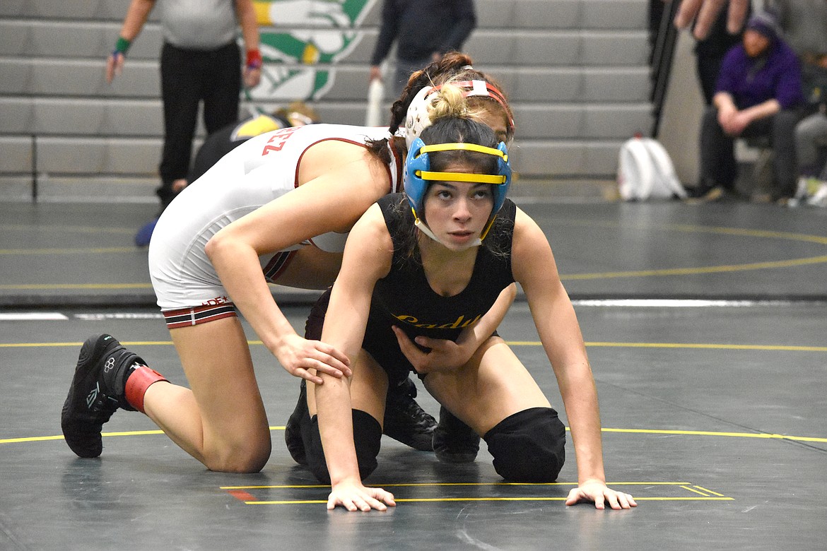 Kendra Perez of Toppenish High School prepares to take on Brianna Martinez of Moses Lake High School at Quincy on Saturday.