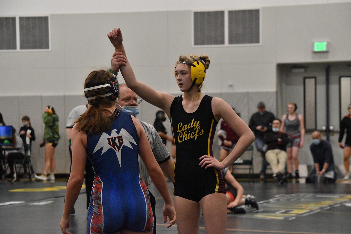 Moses Lake High School junior Kathryn Pugh won her match against Eisenhower High School wrestler Alyssa Lee at the Quincy Bring Home Da Beef tournament on Saturday.