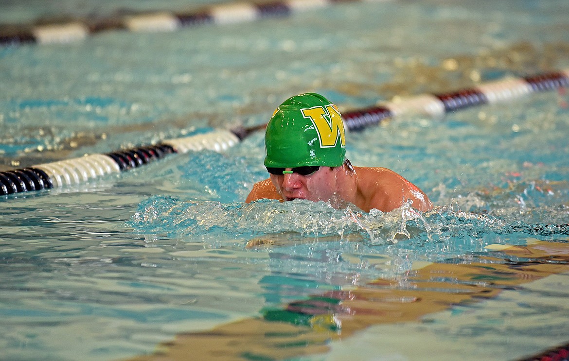 Whitefish senior Aaron Dicks swims in the mens 200 yard medley relay at the Kalispell Invite on Saturday at The Summit. (Whitney England/Whitefish Pilot)