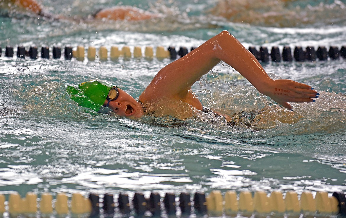 Whitefish's Sydney Macintyre swims in the 200 yard freestyle event at the Kalispell Invite on Saturday at The Summit. (Whitney England/Whitefish Pilot)