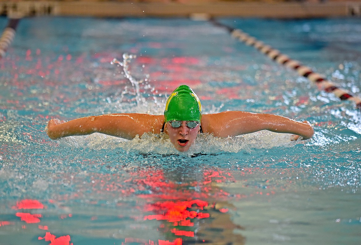 Bulldog Nia Hanson swims in the 100 yard butterfly race at the Kalispell Invite on Saturday at The Summit. (Whitney England/Whitefish Pilot)