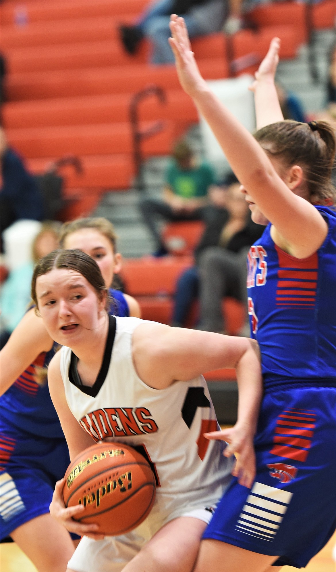 Dani Coffman looks for a shot in the paint against Columbia Falls. (Scot Heisel/Lake County Leader)