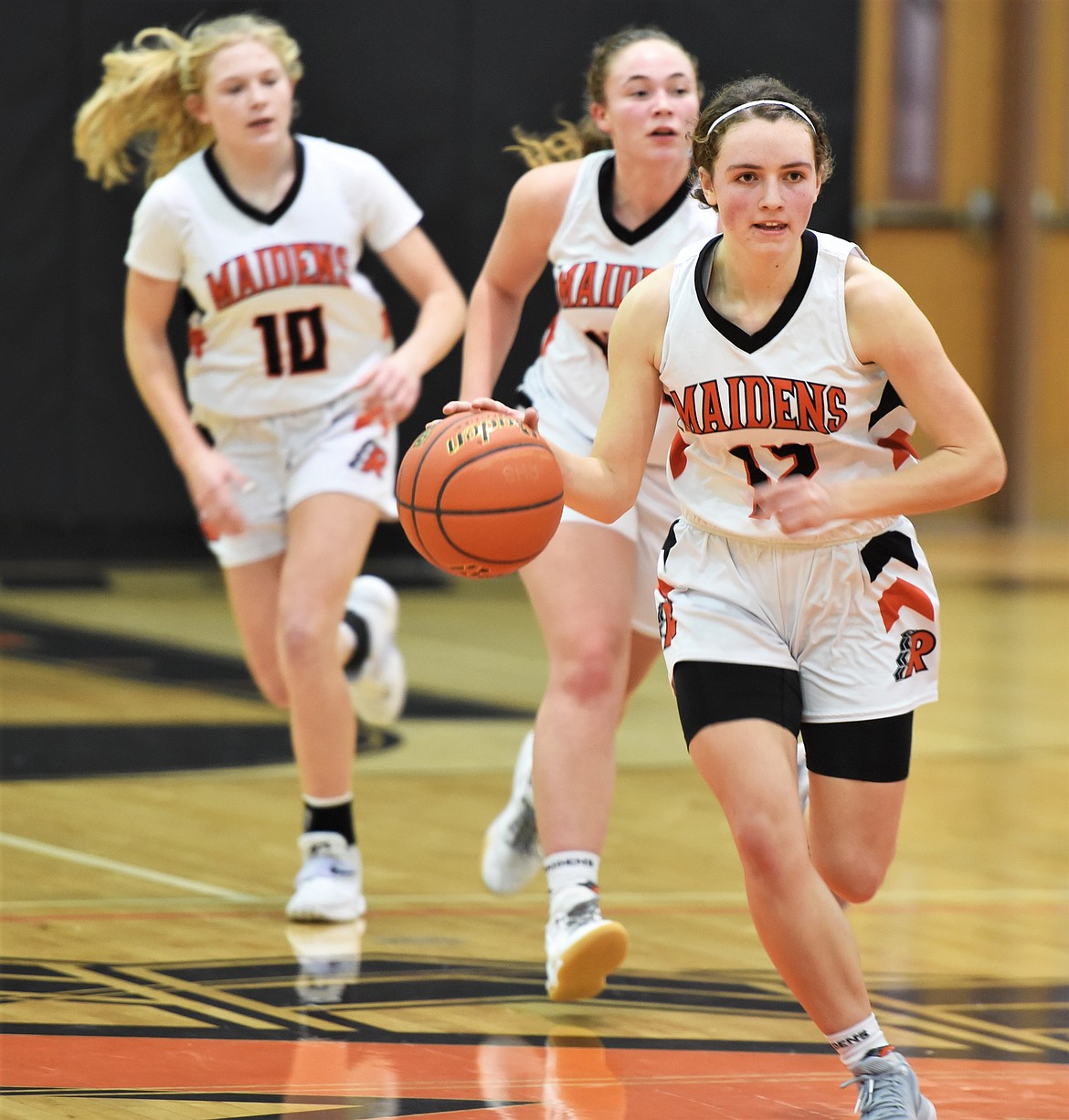 Olivia Heiner leads the way upcourt against Columbia Falls. (Scot Heisel/Lake County Leader)