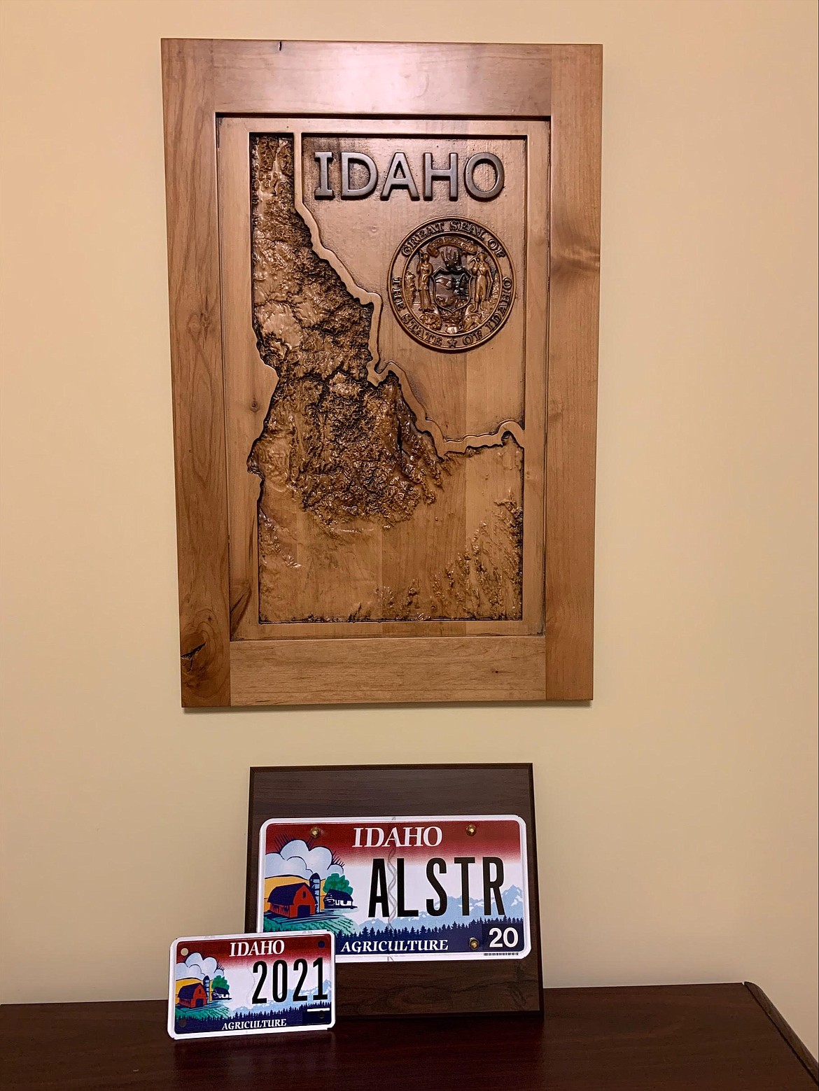 The Ag All Star award was given to Senator Jim Woodward (R-Sagle), and 13 other Idaho Legislators on Wednesday by the Food Producers of Idaho. The license-plate-award is shown on display in Woodward’s office in Boise. The license plates are not “road-worthy” and policy makers cannot put them on their vehicles.