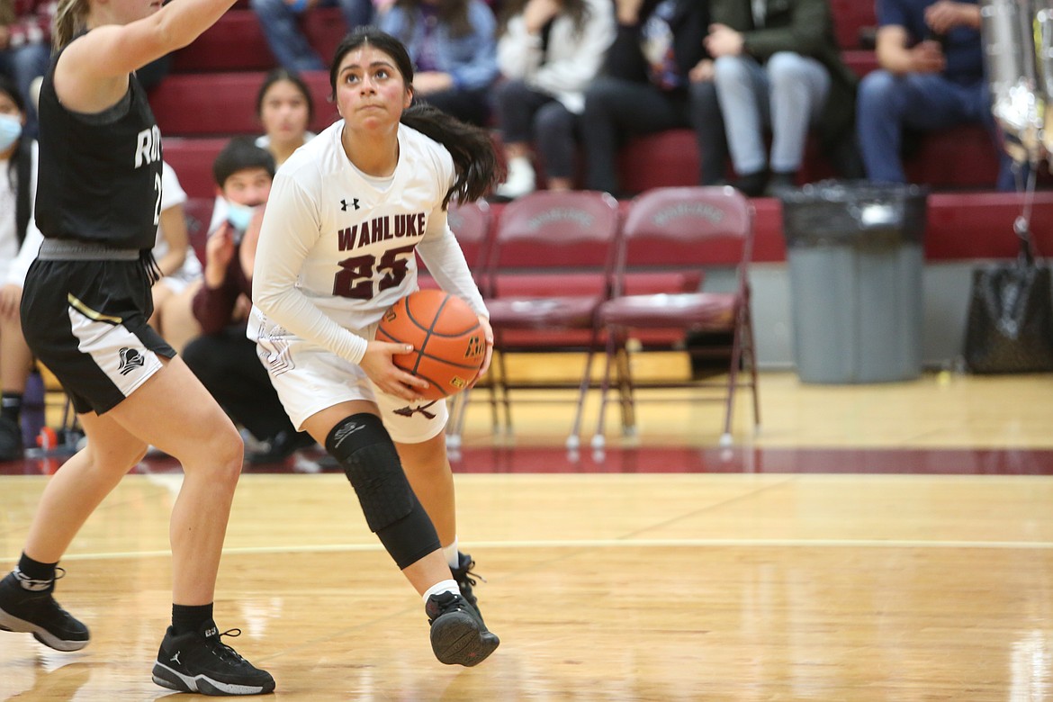 Salma Martinez (25) of Wahluke High School goes up for the shot in the Friday league game with Royal High School at WHS.