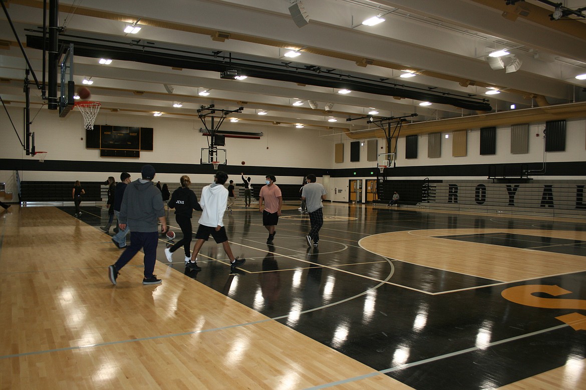 Royal High School physical education students take to the floor in the rebuilt RHS gym on Thursday.