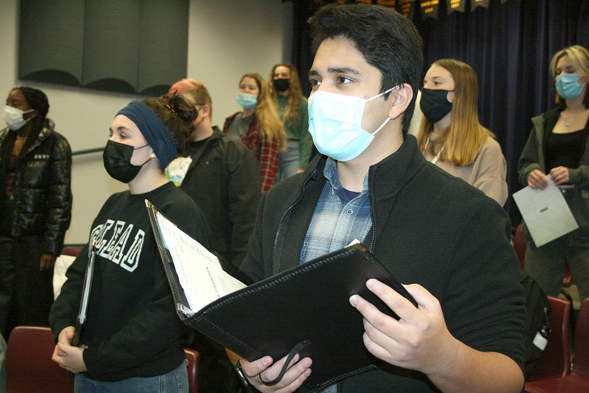 Chamber choir members Alivia Badgley (left) and Nick Lara (right) practice during class at Moses Lake High School Jan. 13.