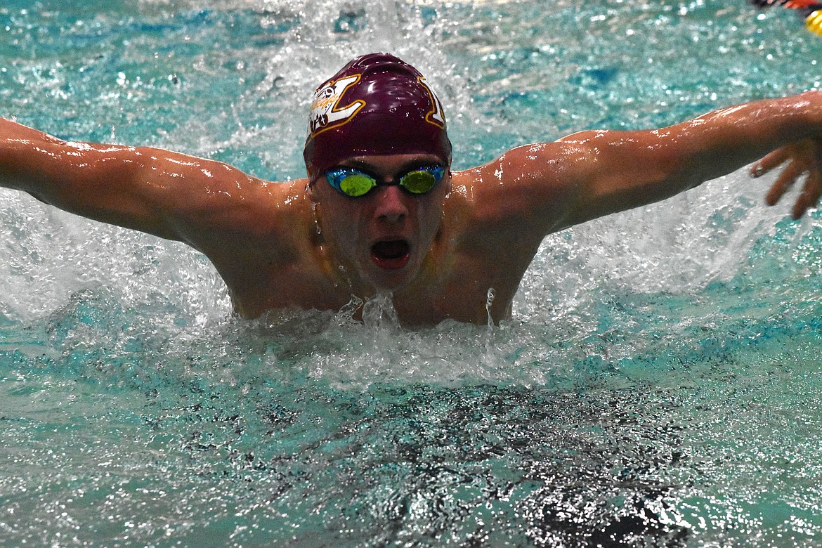 Freshman Luke Molitor swims in the 100-yard butterfly for the Moses Lake High School Chiefs on Jan. 13.
