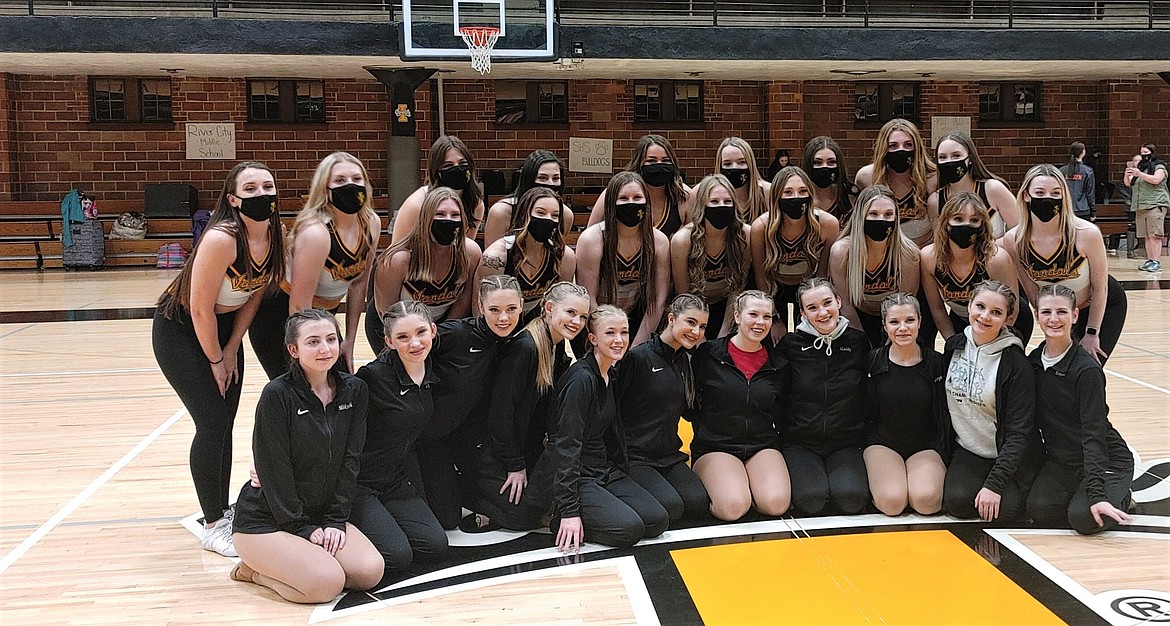 (Front row SHS Dance Team, back row U of I Dance Team) SHS Dance Team claimed grand champion honors at the recent Jan. 15 competition a the University of Idaho in Moscow.