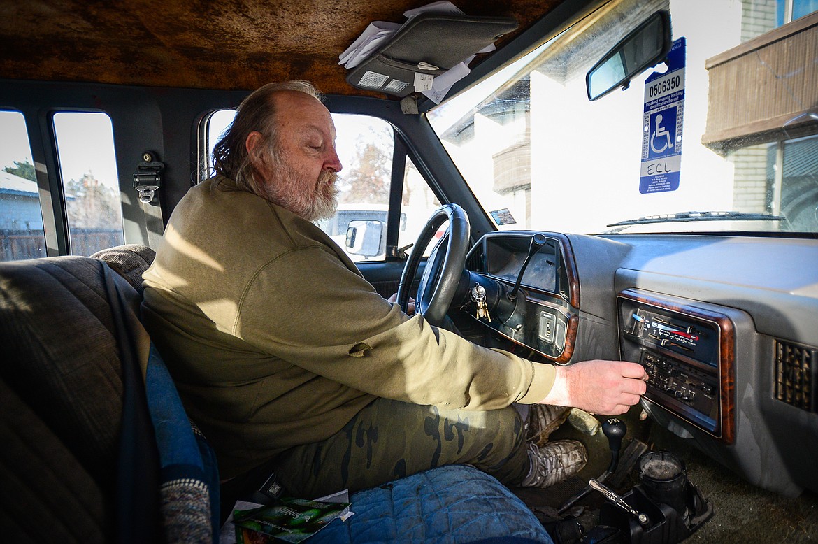 Ed Lauman sits in his truck outside the FairBridge Inn & Suites in Kalispell on Wednesday, Jan. 19. Lauman says that if he and his son have to move out of their residence at the FairBridge, they will sleep in his truck. (Casey Kreider/Daily Inter Lake)