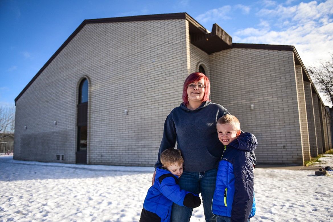 Amber Westphal and her sons Zach Morgan, 4, and Jaeson Anderson, 7, outside their residence at the FairBridge Inn & Suites in Kalispell on Wednesday, Jan. 19. (Casey Kreider/Daily Inter Lake)