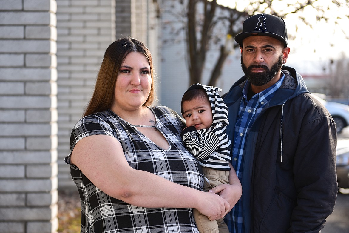 Cheyanne Sciacqua and Anthony Morris with their six-month-old son Jordan outside their residence at the FairBridge Inn & Suites in Kalispell on Wednesday, Jan. 19. (Casey Kreider/Daily Inter Lake)