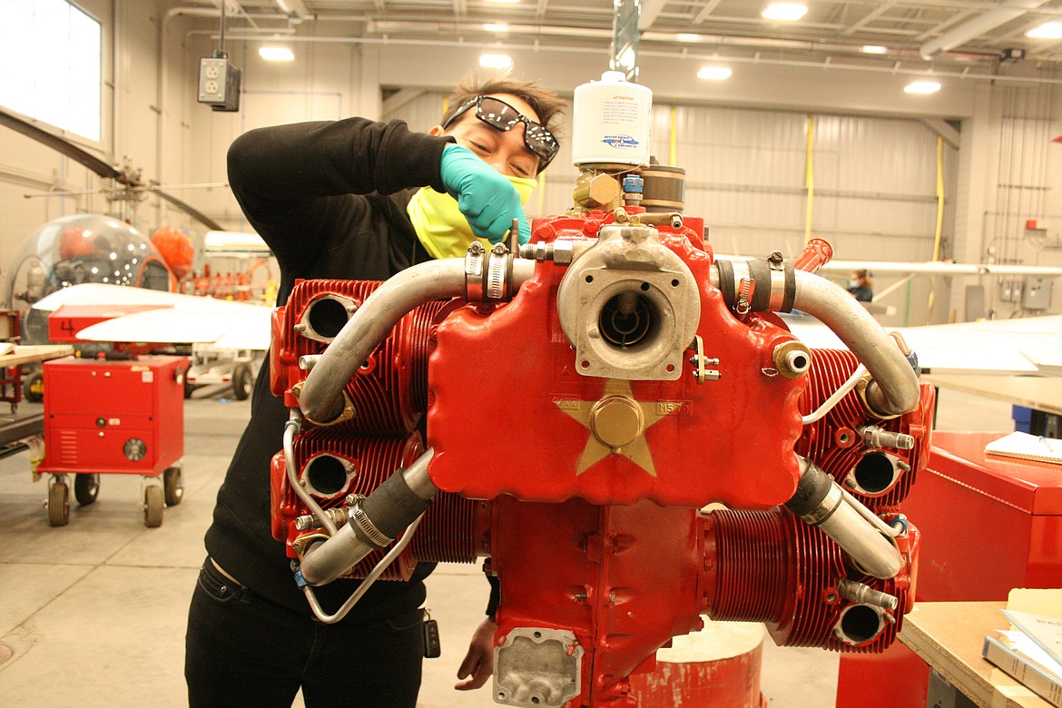 Zachary Acfalle works on an aircraft engine during aviation maintenance technology class at Big Bend Community College on Wednesday.